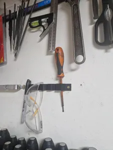 Garage wall tool holder/organizer