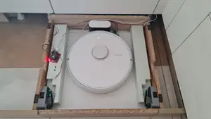 Robotic vacuum garage door v2.0