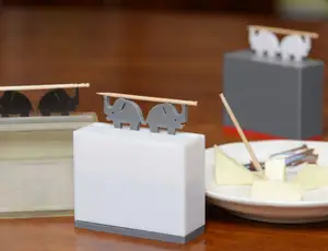 Toothpick dispenser with lever mechanism