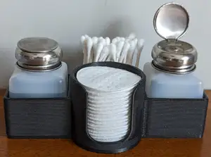 Liquid dispenser caddy with cotton swab/pad holders