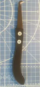 Tile seam reopen tool handle
