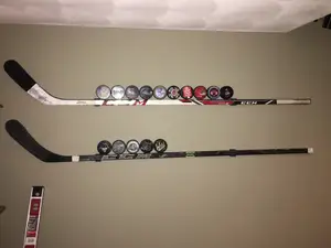 Hockey stick wall mount