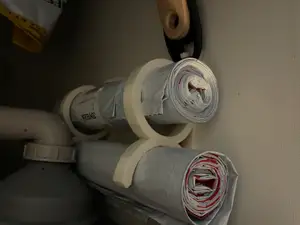 Trash bag roll holder with hand brush and shovel holder