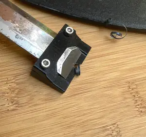 Adjustable chamfer tool for chisel