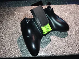 XBox 360 wireless controller battery holder with removable cover