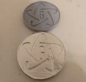 Metal cast challenge coin and mold
