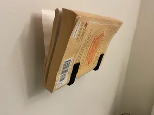 Wall mountable single book stand