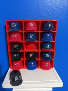 Shadowbox to display mini plastic baseball helmets