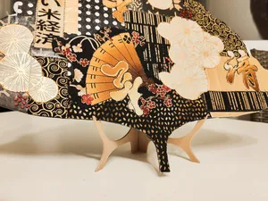 Decorative vertical holder for frame or plate