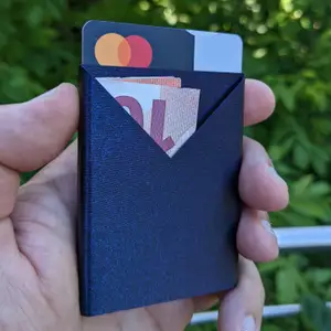 Single piece slim wallet for cards, bills and coins