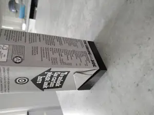 Yoghurt package holder for packages with sloped top