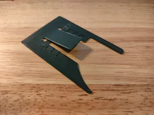Springloaded credit card spacer for "Pop-up credit card wallet spreader with coin/cash storage"