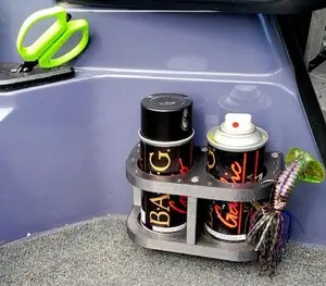 Fish attractant spray and lure holder for boats
