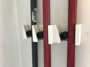 Triple & quadruple gravity broom holder + gear for smaller diameter broom sticks