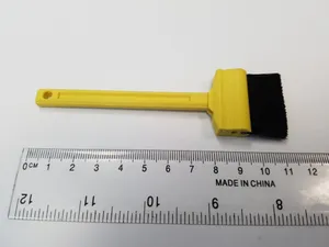 Small broom desktop using door brush
