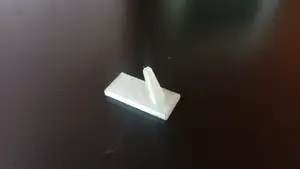 Small hanger on the wall, a piece of furniture.