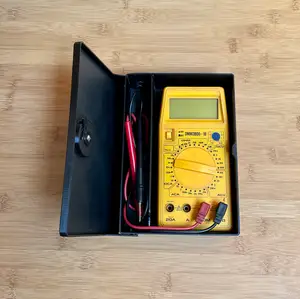 Box for multimeter with rotary lock