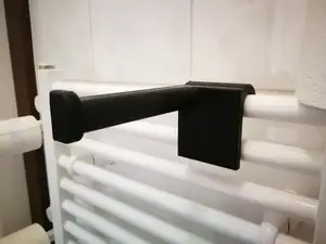 Towel dryer toilet paper hanger