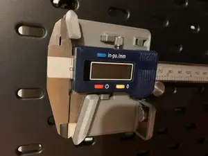 SKADIS caliper holder with battery shelf