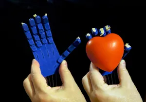 Prosthetic/Robotic Hand Printable As An Assembled Unit Without Supports