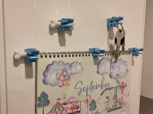 Flip calendar magnetic holder