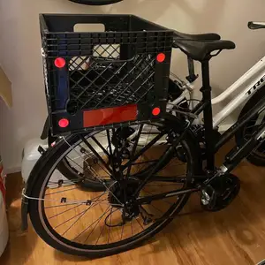 Topeak QuickTrack MTX rack wedge mounted to milk crate with zipties (openscad)