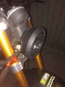 Bezel of the headlight motorcycle Caballero
