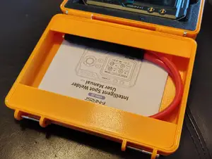 Storage for cables in the lid