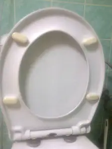 Toilet seat spacer
