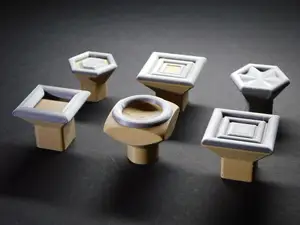 Knobs and handles for doors and drawers