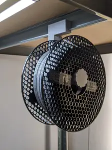 Metal shelving spool holder