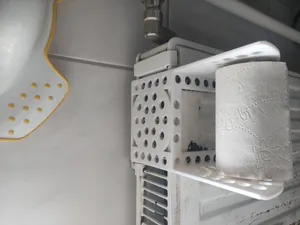 Toilet paper holder with mug stand