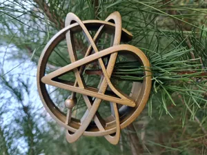 Atheist winter feast - tree top - Atomic Whirl logo