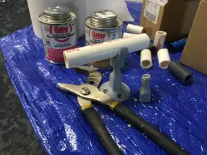 Adjustable PVC pipe holder