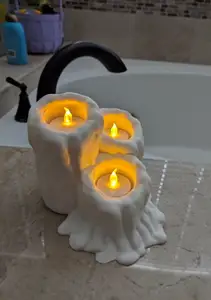 Melting candles tea light holder