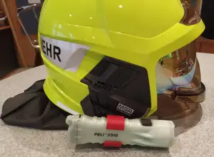 Peli 3310 holder for MSA fire department helmets