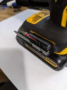 Low profile double bit holder for drills or drivers