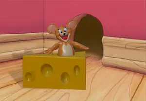 Cartoon Mouse From Tom and Jerry Coming Out of Block Of Cheese