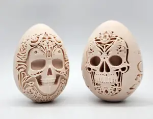 2 Carved Skull Eggs
