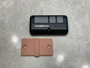 Wall mount for garage door remote opener