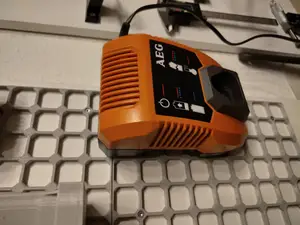 openGrid holder AEG Li-202C Battery Charger 12V also Ridgid