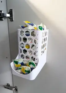 Material saving dishwasher tablet dispenser
