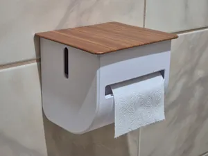 Enclosed Toilet Paper Dispenser