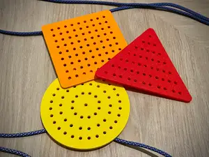 Game for children Geometric shapes and thread