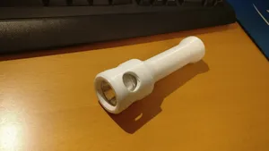 Flashlight body for LED/reflector drop-in module