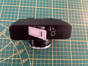 Minolta HI-MATIC F battery compartment cover