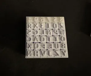 English Alphabet Stamps in a Box