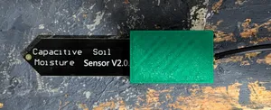 Cap for sealing soil moisture sensor with silicone