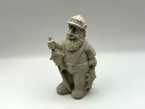 Carved Fisherman Figurine