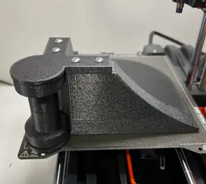 Carwash hose roller wheel guide